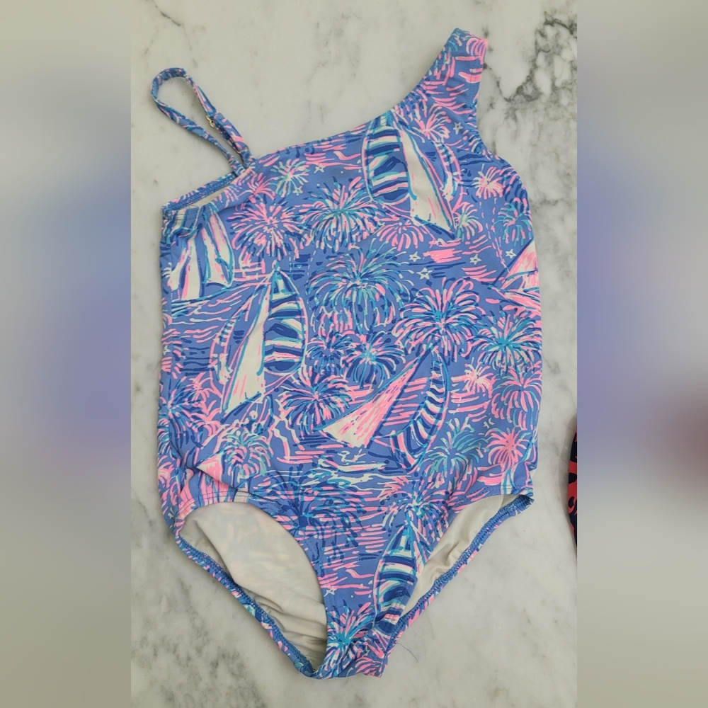 Lilly Pulitzer Girls Tiara Swimsuit Print is: It’s a Sailabration UPF50. Size 4